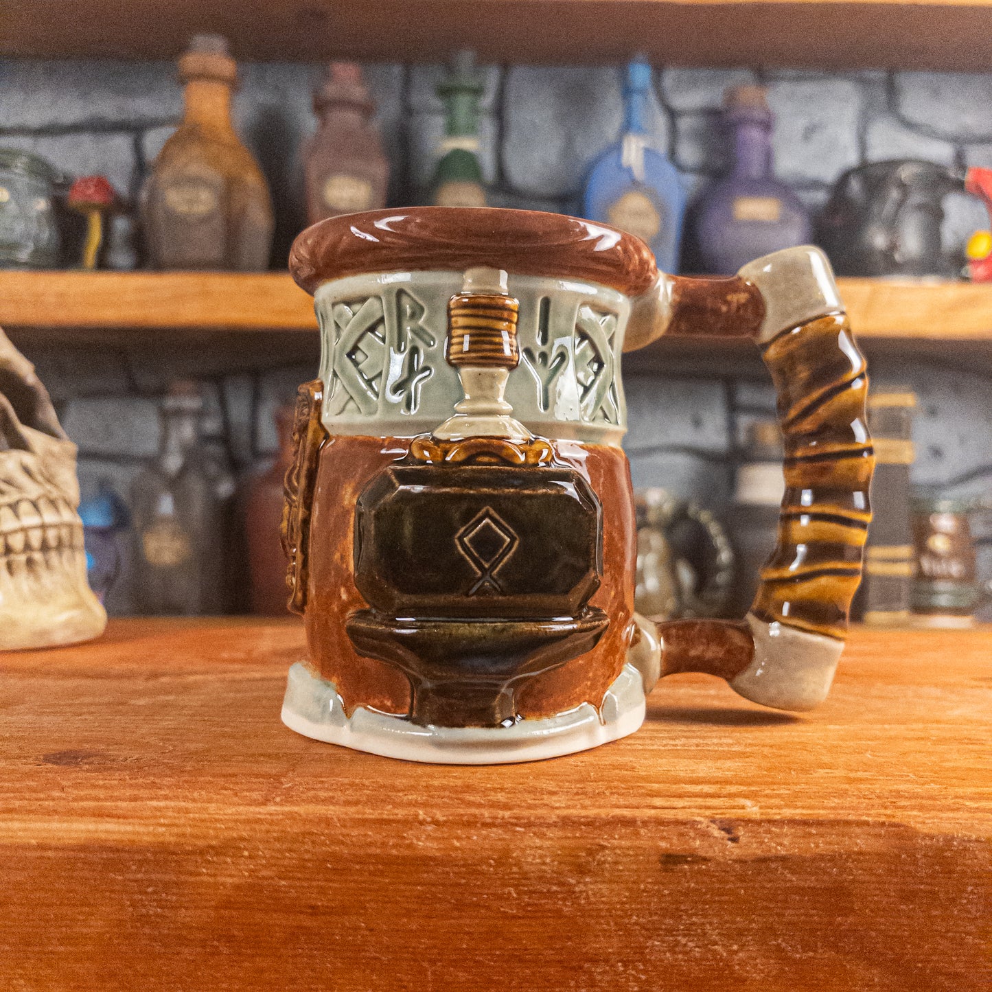The right side view of a handmade Dwarven Mug designed to look like a light green and reddish brown barrel with intricate rune carvings, a partial dwarf face, and a hammer and anvil design, showing the detailed handle.